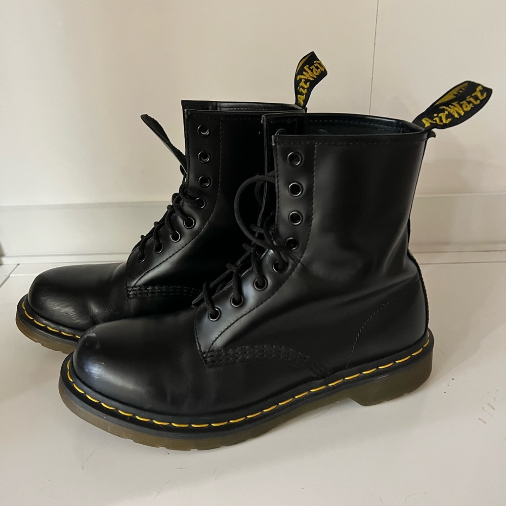 Dr. Marten’s lace up black combat boots